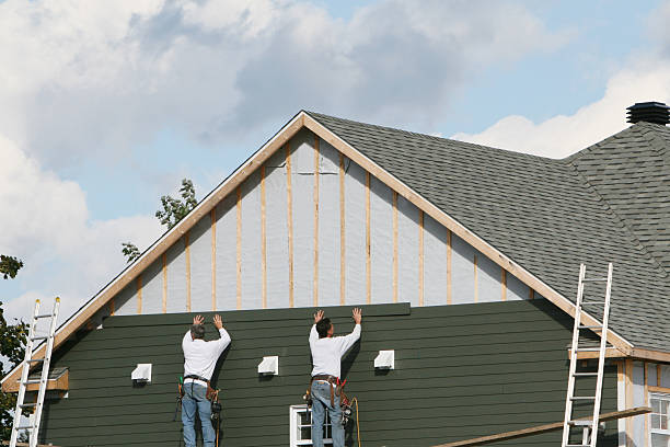 Professional Siding technician working in Westchester, FL